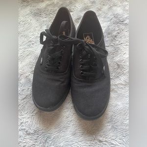 All black Vans sneakers size 7.5 in women’s & 6 in men’s